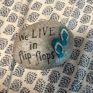 We Live in flip flops decorative rock